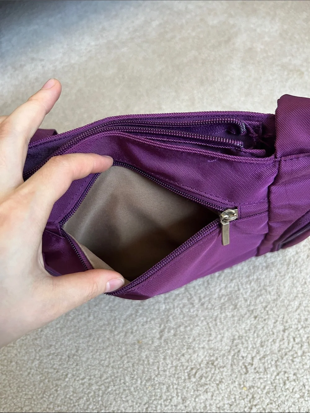 Compact Purple Crossbody Bag with Triple Front Zips